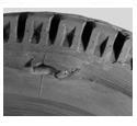 Ecorchure périphérique du flanc du pneu